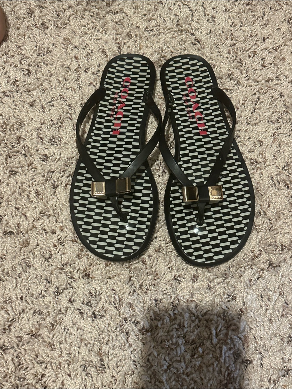 Coach Black Flip Flops with Pink Logo and Gold Bow Accents